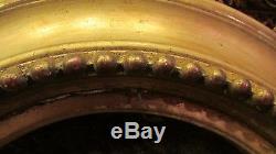 Ancien cadre medaillon ovale pour glace tableau doré epoque XIXe bois et stuc