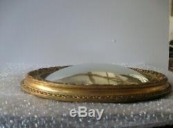 Ancien miroir de sorcière ovale, cadre en bois doré, bon état