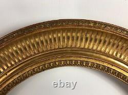 Cadre Ovale à cannelures bois sculpté doré à la feuille, XIXe siècle 49,5x44cm