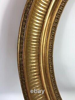 Cadre Ovale à cannelures bois sculpté doré à la feuille, XIXe siècle 49,5x44cm
