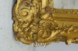 Cadre à oreilles bois et stuc doré époque fin XIXème