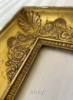 Cadre ancien à palmettes époque Empire XIXè en bois doré montage à clefs clé