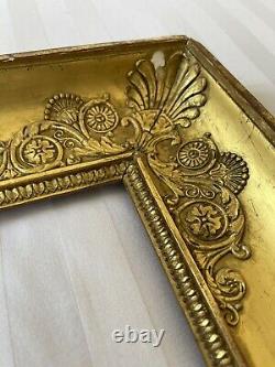 Cadre ancien à palmettes époque Empire XIXè en bois doré montage à clefs clé