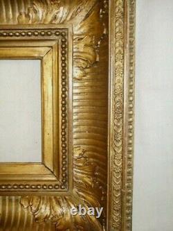 Cadre ancien à tableau XIXème siècle bois doré chassis à clés bon état