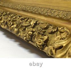 Cadre ancien du XIX ème siècle en bois richement décoré Feuillure 67x51,5 cm