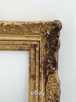Cadre ancien en bois et stuc doré Louis XV