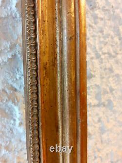 EXCEPTIONNEL GRAND CADRE en bois mouluré et doré, époque LOUIS XVI, fin 18ème