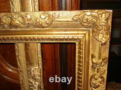 Grand cadre bois doré style louis 14 19eme
