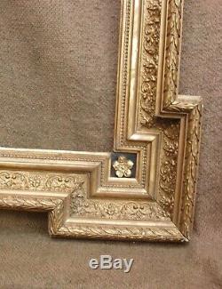 Important cadre Napoléon III en bois et stucs dorés 58 x 47 cm environ