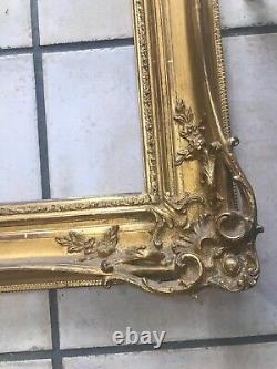 Magnifique cadre ancien doré sculpté motifs format 86X71 à restaurer
