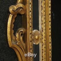Miroir caminiera en bois sculpté d'or cadre italienne style antique 900