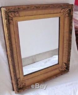Miroir dans cadre en bois doré XIXème