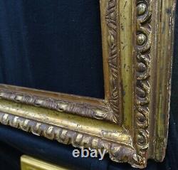 N° 815 Cadre en Bois sculpté doré du XVIIème siècle pour châssis 80,7 x 60,5 cm