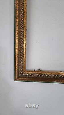 Old photo frame in golden wood, carved. Framecadre doré ancien Bois sculpté