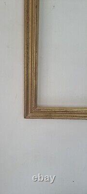 Old wooden golden frame. Ancien cadre doré en bois. Cadres de tableaux ou photos