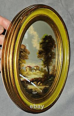 Peinture ovale Paysage avec rivière maison et pont cadre bois vert et doré