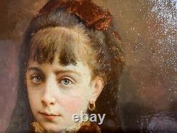 Portrait de petite fille signé et daté de 1884, très beau cadre en bois doré