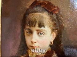 Portrait de petite fille signé et daté de 1884, très beau cadre en bois doré