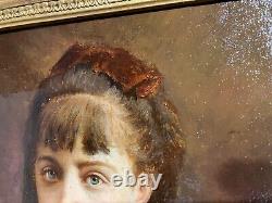 Portrait de petite fille signé et daté de 1884, très beau cadre en bois doré