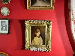 Portrait de petite fille signé et daté de 1884, très beau cadre en bois doré