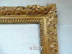 RARISSIME et GRAND CADRE, bois sculpté et doré, monté à clefs, LOUIS XIV, 17ème