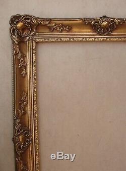 Superbe et imposant cadre en bois doré de style Louis XV format 12 P environ